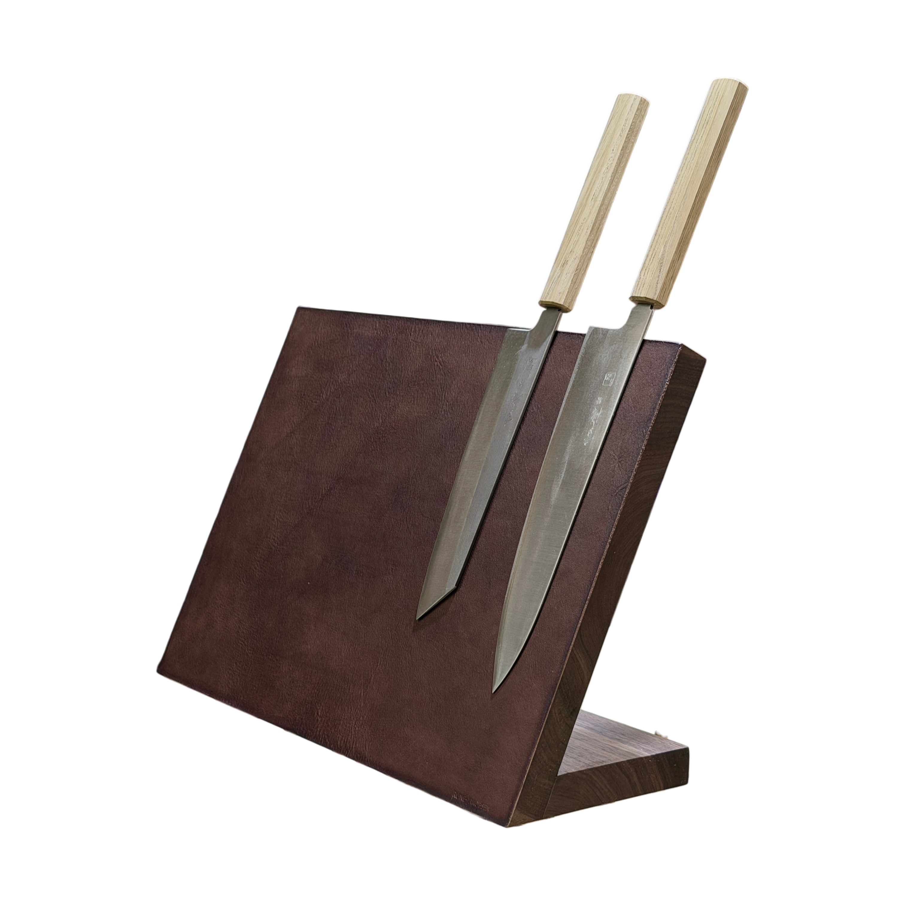 Leather Windswept - 30 or 40 cm wide, angled magnetic knife block covered in Italian leather. Height 30 cm.