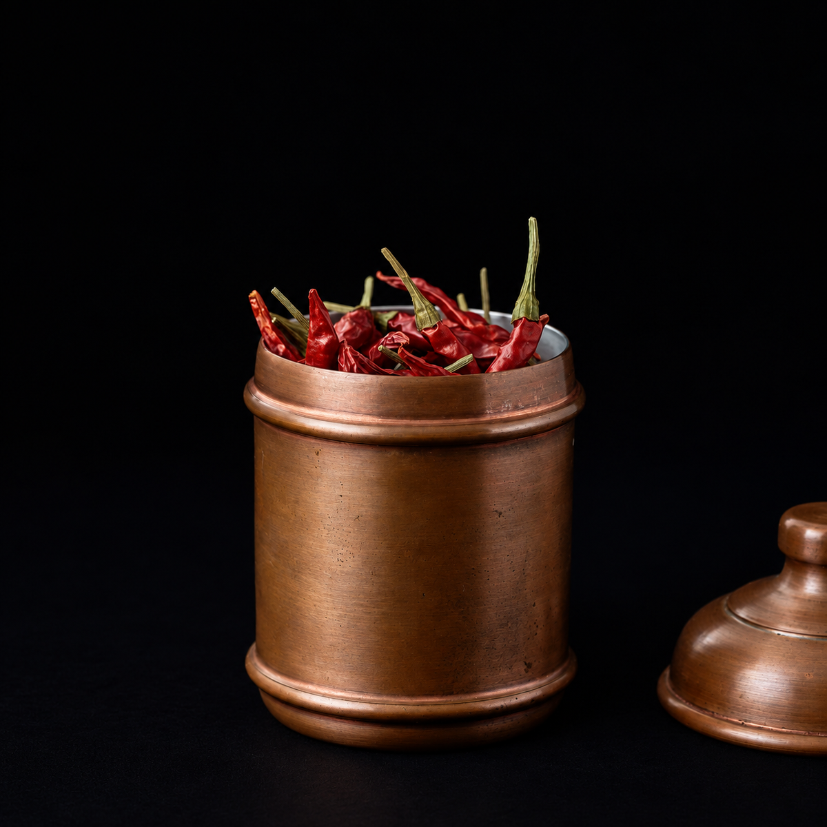 India – copper canister with dried chillies, by Sakami Kogei
