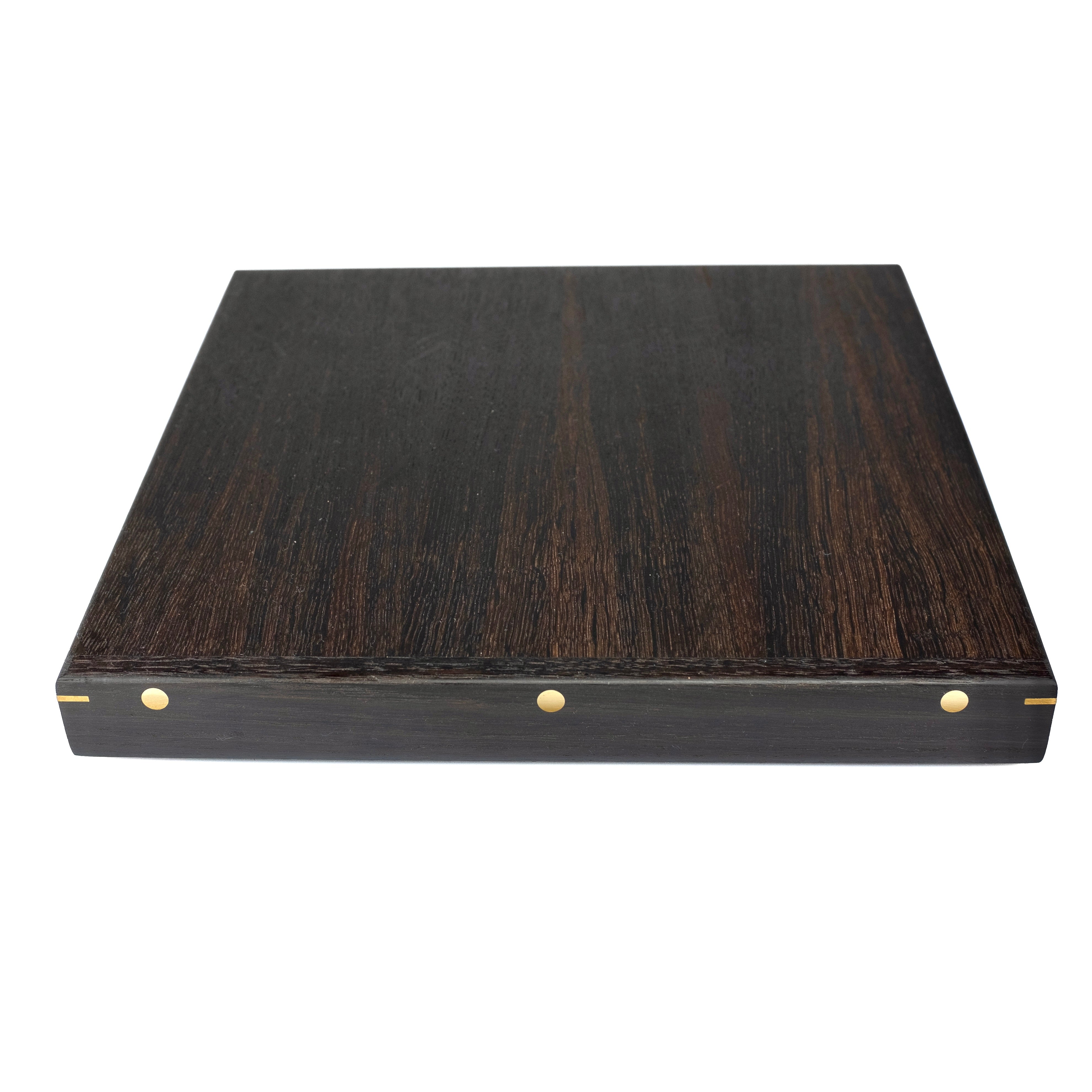 'Forefront' cutting board with wooden front edge and details in brass, copper or aluminum