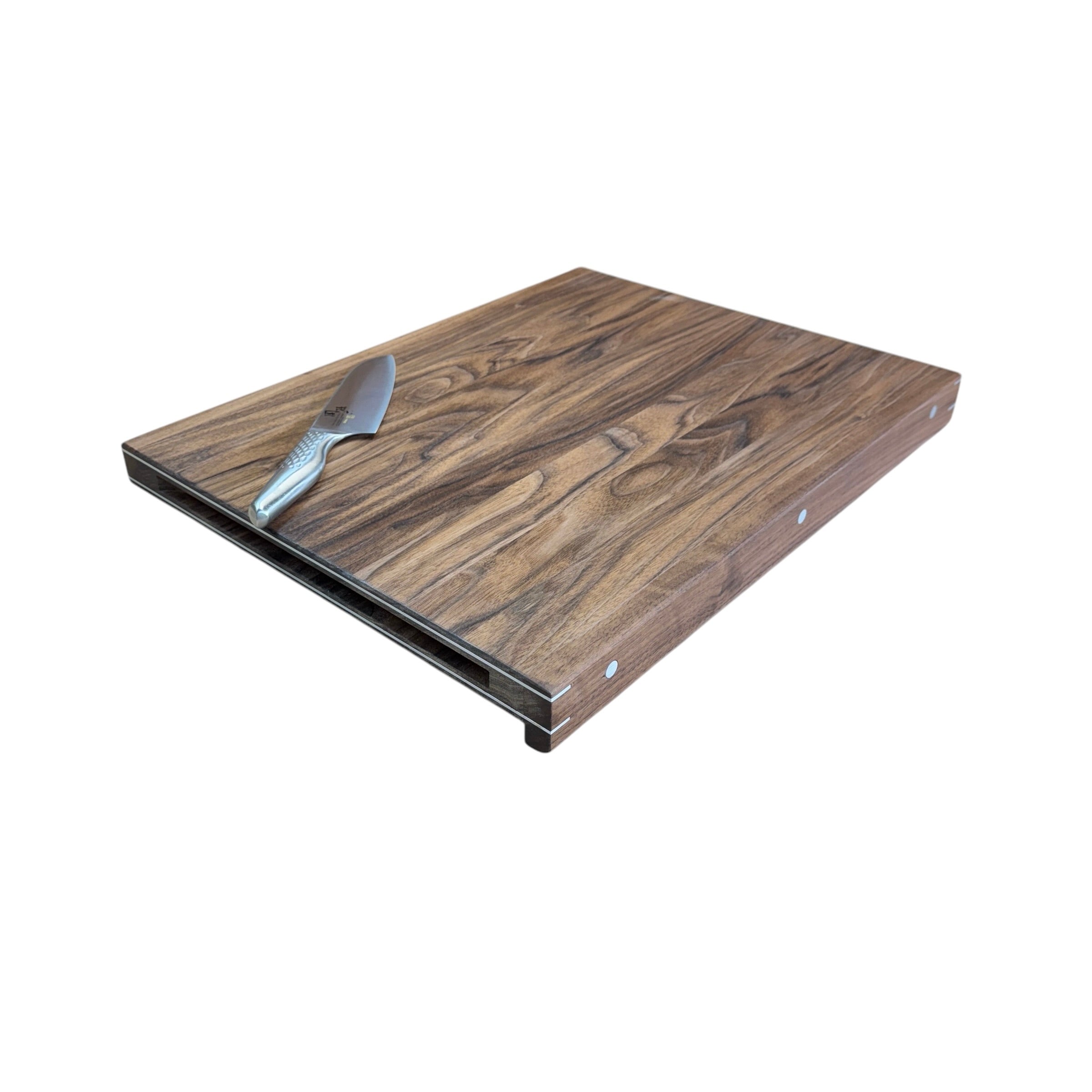 'Forefront' cutting board with wooden front edge and details in brass, copper or aluminum